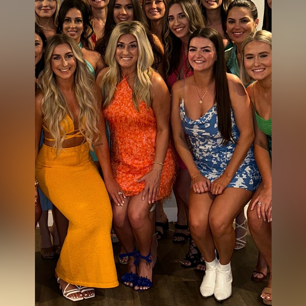 ORANGE TEXTURED FLORAL HALTER DRESS